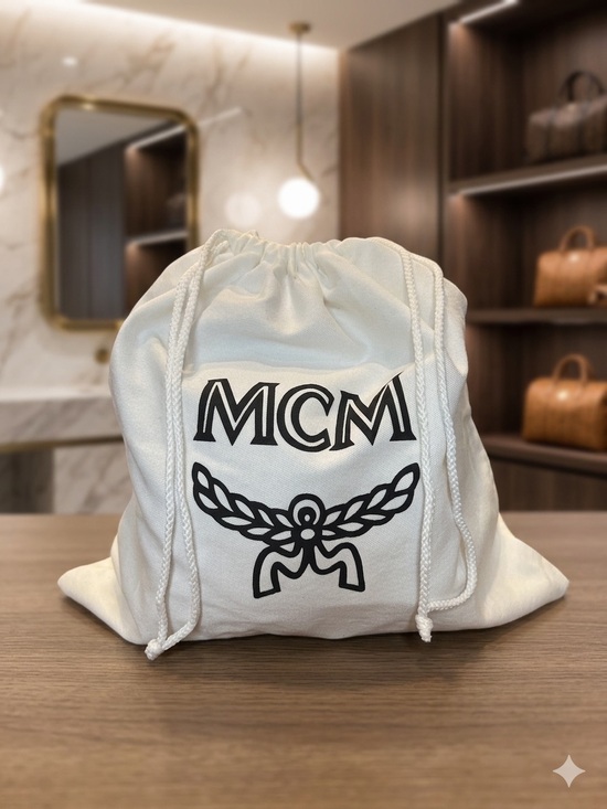 MCM Handbags - MCM Cream Drawstring Dust Bag with Black Logo